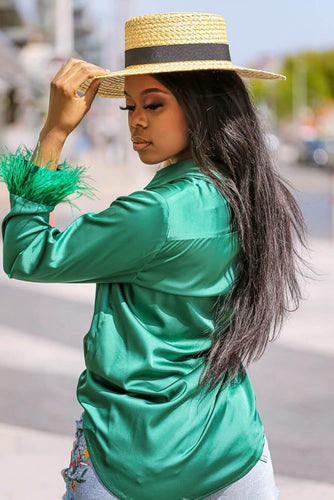 Back view of the Faux Feather Trim Green Blouse, showcasing the unique and stylish faux ostrich feather trim. This blouse is made from comfortable satin material and can be paired with a range of bottoms for a versatile look.